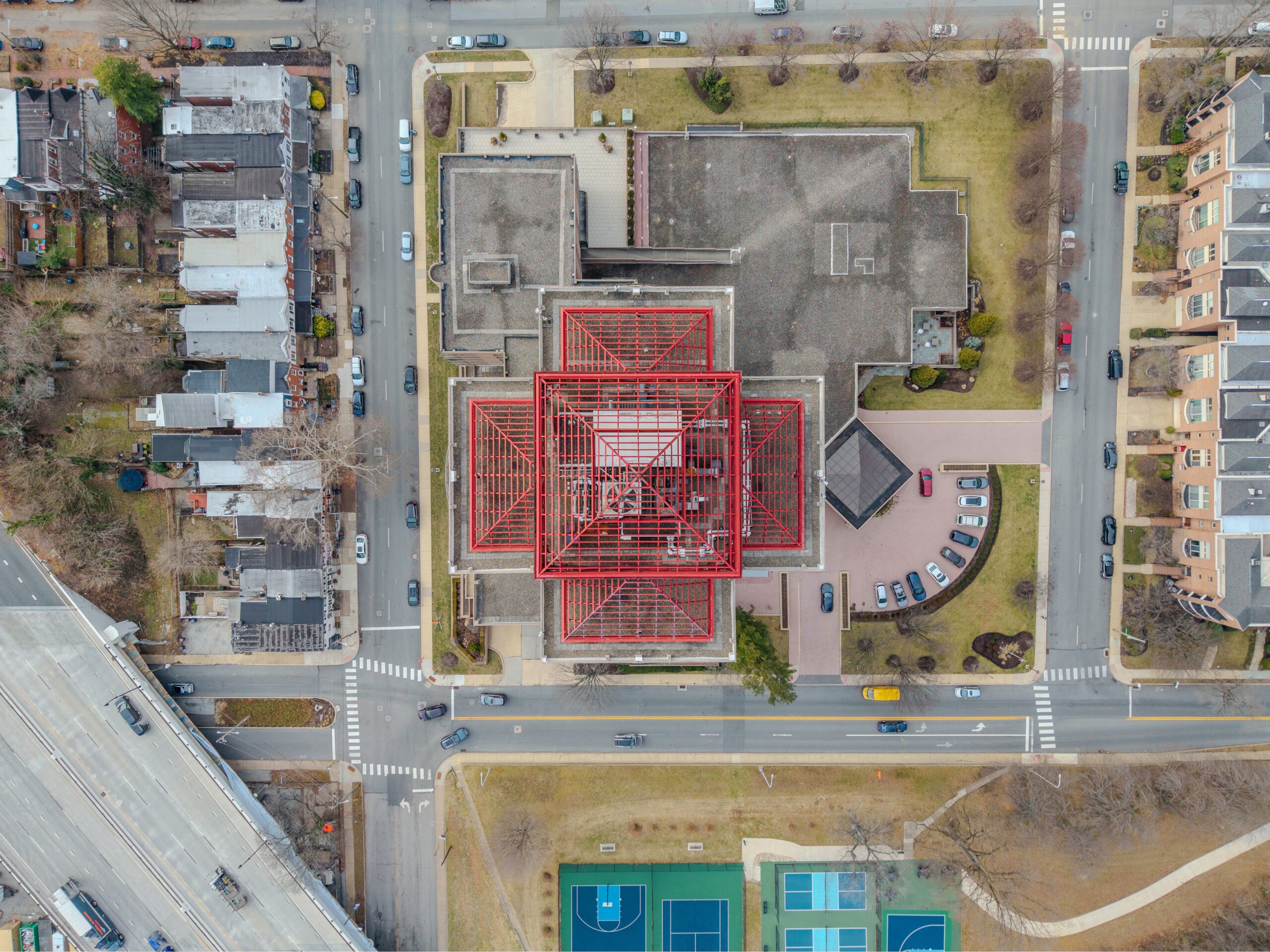 Overhead drone view of Park Plaza Condominium in Wilmington, Delaware, showing the rooftop structure and surrounding neighborhood during a balcony inspection project